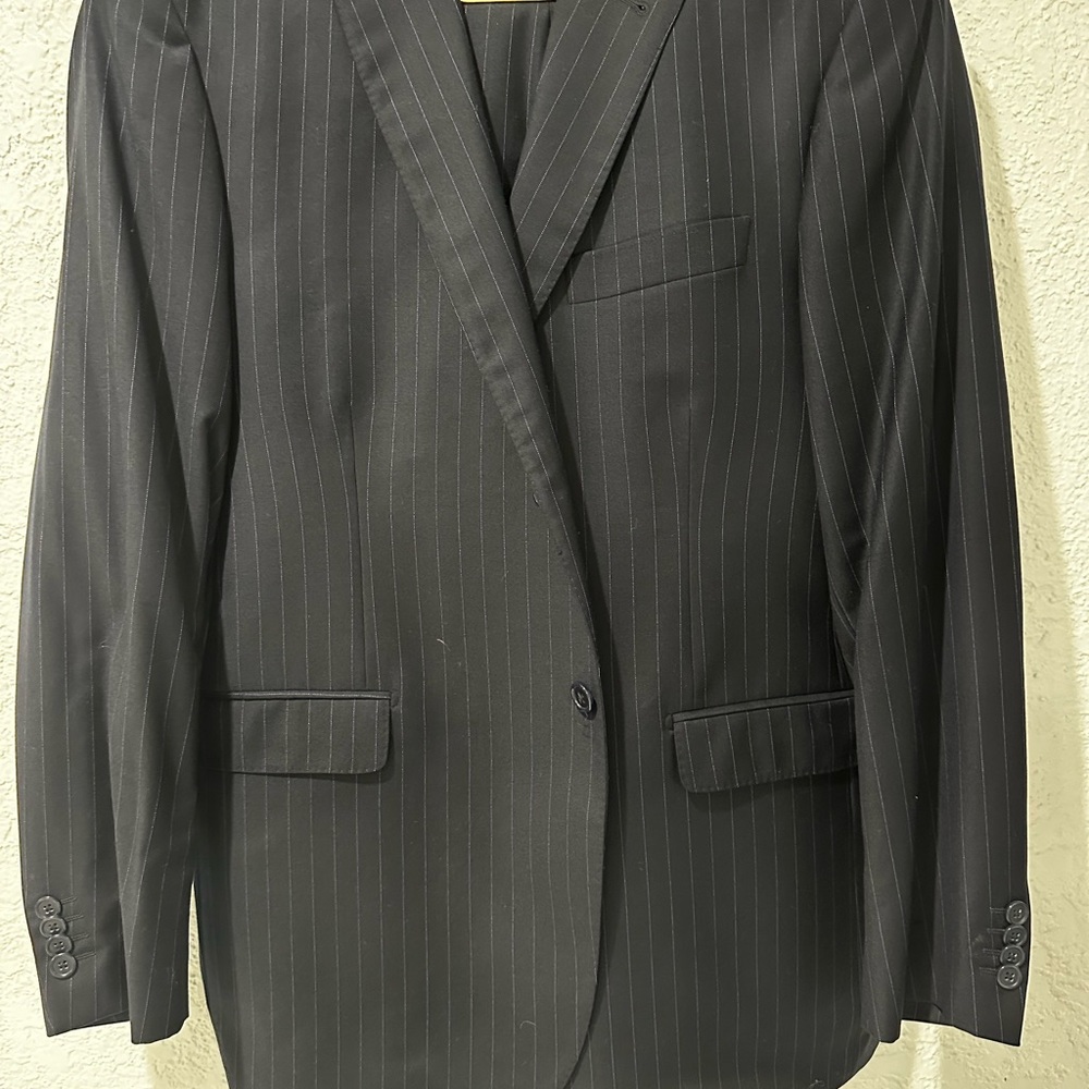 Most fine Italian suit. Elegand and sleek.